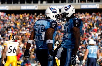 NASHVILLE, TN - DECEMBER 21:  Justin Gage #12 of the Tennessee Titans celebrates with teammate LenDale White #25 after scoring a touchdown against the Pittsburgh Steelers during their game on December 21, 2008 at LP Field in Nashville, Tennessee.  (Photo 