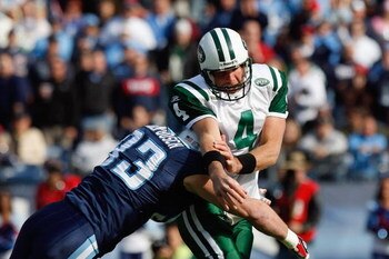 NASHVILLE, TN - NOVEMBER 23:  Quarterback Brett Favre #4 of the New York Jets is sacked by Kyle Vanden Bosch #93 of the Tennessee Titans at LP Field on November 23, 2008 in Nashville, Tennessee. (Photo by Kevin C. Cox/Getty Images)