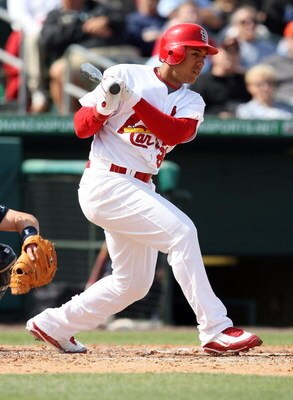 JUPITER, FL - MARCH 02:  Jon Jay #88 of the St. Louis Cardinals follows his ground ball to first base against the Tampa Bay Rays during a spring training game at Roger Dean Stadium on March 2, 2009 in Jupiter, Florida. The Rays defeated the Cardinals 8-5.