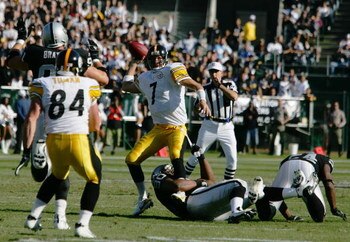 OAKLAND, CA - OCTOBER 29:  Ben Roethlisberger #7 of the Pittsburgh Steelers passes the ball against pressure from Terdell Sands #90 of the Oakland Raiders during an NFL game at McAfee Coliseum October 29, 2006 in Oakland, California.  (Photo by Robert Lab