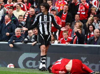 LIVERPOOL, UNITED KINGDOM - MAY 03:  Joey Barton of Newcastle United protests after a challenge on Xabi Alonso of Liverpool and is subsequently sent off by Referee Phil Dowd during the Barclays Premier League match between Liverpool and Newcastle United a