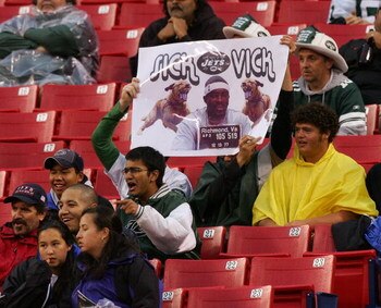 EAST RUTHERFORD, NJ - AUGUST 10: Fans hold up a banner in reference to Atlanta Falcon quarterback Michael Vick as the New York Jets play the Falcons at Giants Stadium August 10, 2007 in East Rutherford, New Jersey. Vick is facing charges of dogfighting.  