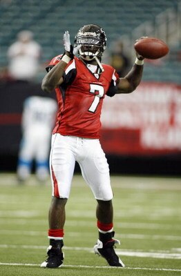 ATLANTA - DECEMBER 24: Quarterback Michael Vick #7 of the Atlanta Falcons passes the ball before the game against the Carolina Panthers on December 24, 2006 at The Georgia Dome in Atlanta,Georgia. (Photo by Marc Serota/Getty Images)