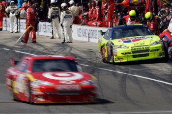 INDIANAPOLIS - JULY 26:  Juan Pablo Montoya, driver of the #42 Target Chevrolet, is caught for speeding down pit road during the NASCAR Sprint Cup Series Allstate 400 at the Brickyard at Indianapolis Motor Speedway on July 26, 2009 in Indianapolis, Indian
