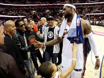 CLEVELAND - MAY 28: LeBron James #23 of the Cleveland Cavaliers shakes hands with rapper/producer Jay-Z after defeating the Orlando Magic in Game Five of the Eastern Conference Finals during the 2009 Playoffs at Quicken Loans Arena on May 28, 2009 in Clev