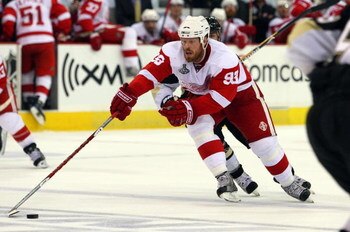 PITTSBURGH - JUNE 09:  Johan Franzen #93 of the Detroit Red Wings skates against the Pittsburgh Penguins during Game Six of the NHL Stanley Cup Finals at the Mellon Arena on June 9, 2009 in Pittsburgh, Pennsylvania.  (Photo by Jim McIsaac/Getty Images)