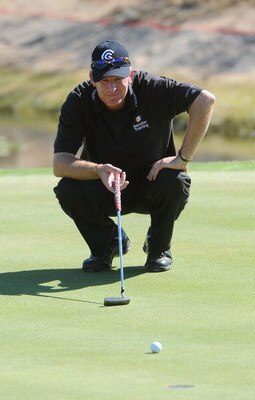 SCOTTSDALE, AZ - OCTOBER 23: Woody Austin lines up a par putt on the 16th hole during the first round of  the Frys.com Open held at Grayhawk Golf Club on October 23, 2008 in Scottsdale, Arizona. (Photo by Marc Feldman/Getty Images)