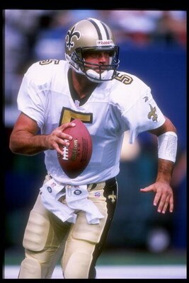 28 Sep 1997:  Quarterback Heath Shuler #5 of the New Orleans Saints scrambles with the football during the Saints 14-9 loss to the New York Giants at Giants Stadium in East Rutherford, New Jersey. Mandatory Credit: Al Bello  /Allsport
