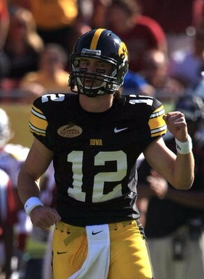 TAMPA, FL - JANUARY 01:  Ricky Stanzi #12 of the Iowa Hawkeyes celebrates a touchdown pass against the South Carolina Gamecocks during the Outback Bowl on January 1, 2009 at Raymond James Stadium in Tampa, Florida.  (Photo by Scott Halleran/Getty Images)