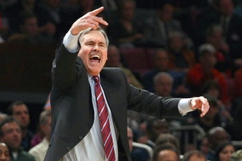 NEW YORK - FEBRUARY 17:  Head coach Mike D'Antoni of the New York Knicks yells during the game against the San Antonio Spurs at Madison Square Garden on February 17, 2009 in New York City. NOTE TO USER: User expressly acknowledges and agrees that, by down