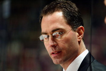 EAST RUTHERFORD, NJ - JANUARY 20:  Head coach John Stevens of the Philadelphia Flyers looks on against the New Jersey Devils at Continental Airlines Arena on January 20, 2007 in East Rutherford, New Jersey. The Devils won 4-3 in a shootout. (Photo by Chri