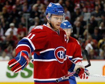 MONTREAL- APRIL 22:  Saku Koivu #11 of the Montreal Canadiens prepares for a faceoff during Game Four of the Eastern Conference Quarterfinals of the 2009 Stanley Cup Playoffs against the Boston Bruins at the Bell Centre on April 22, 2009 in Montreal, Queb