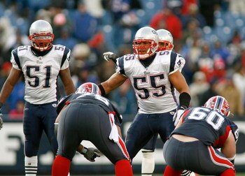 ORCHARD PARK, NY - DECEMBER 28: Jerod Mayo #51 and Junior Seau #55 of the New England Patriots ready the defense against the Buffalo Bills at Ralph Wilson Stadium December 28, 2008 in Orchard Park, New York. The Patriots won 13-0.  (Photo by Rick Stewart/