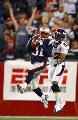FOXBORO, MA - OCTOBER 20: Darrell Jackson #82 of the Denver Broncos has a pass intended for him intercepted by Brandon Meriweather #31 of New England Patriots at Gillette Stadium on October 20, 2008 in Foxboro, Massachusetts. (Photo by Jim Rogash/Getty Im