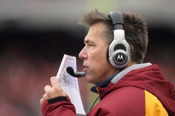 CINCINNATI - DECEMBER 14: Head coach  Jim Zorn of the Washington Redskins talks on his headphones during the NFL game against the Cincinnati Bengals at Paul Brown Stadium December 14, 2008 in Cincinnati, Ohio. (Photo by Andy Lyons/Getty Images)