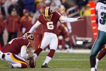 LANDOVER, MD - DECEMBER 21:  Shaun Suisham #6 of the Washington Redskins kicks a field goal during the game of the Philadelphia Eagles on December 21, 2008 at FedEx Field in Landover, Maryland.  (Photo by Kevin C. Cox/Getty Images)