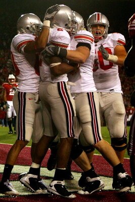 MADISON, WI - OCTOBER 04:  Quarterback Terrelle Pryor #2 of the Ohio State Buckeyes is congratulated in the end zone after scoring the go ahead touchdown against the Wisconsin Badgers late in the fourth quarter at Camp Randall Stadium October 4, 2008 in M