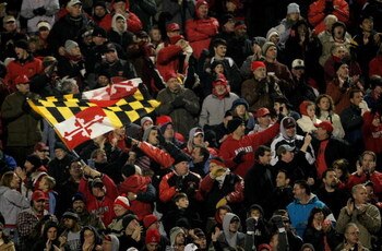 COLLEGE PARK, MD - NOVEMBER 10:  A Maryland fan waves the state flag as the Boston College Eagles square off against the Maryland Terrapins at Byrd Stadium on November 10, 2007 in College Park, Maryland.  (Photo by Doug Pensinger/Getty Images)