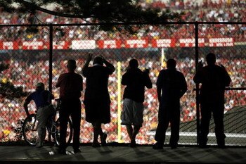 COLLEGE PARK, MD - SEPTEMBER 13:  Fans watch the action from outside the stadium during the game between the West Virginia Mountaineers and the Maryland Terrapins on September 13, 2007 at Byrd Stadium in College Park, Maryland.  (Photo by Jamie Squire/Get