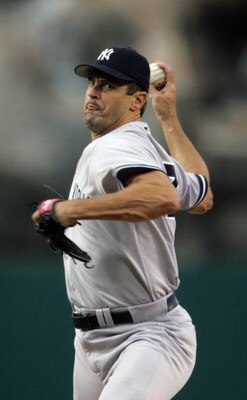 ANAHEIM, CA - JULY 23:  Kevin Brown #27 of the New York Yankees pitches during the game with the Los Angeles Angels of Anaheim at Angel Stadium on July 23, 2005 in Anaheim, California. The Angels defeated the Yankees 8-6. (Photo by Jeff Gross/Getty Images