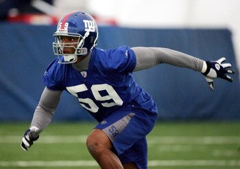 EAST RUTHERFORD, NJ - MAY 15:  Gerris Wilkinson #59 runs a drill during the New York Giants rookie mini camp at the practice field at Giants Stadium on May 15, 2006 in East Rutherford, New Jersey.  (Photo by Jim McIsaac/Getty Images)