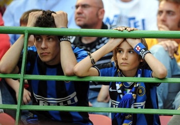 MILAN, ITALY - MAY 11:  Disappointed fans of Inter look at the Serie A match between Inter and Siena at the Stadio San Siro on May 11, 2008 in Milan, Italy.  (Photo by New Press/Getty Images)