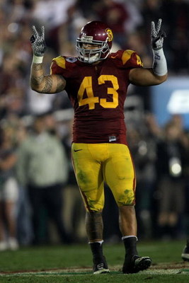 PASADENA, CA - JANUARY 01: Kaluka Maiava #43 of the USC Trojans celebrates near the end of the Trojans' win over the Penn State Nittany Lions at the 95th Rose Bowl Game presented by Citi on January 1, 2009 at the Rose Bowl in Pasadena, California. (Phot