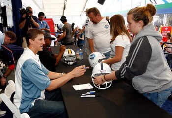 TAMPA, FL - JANUARY 24:  Quarterback Luke McCown #12 of the Tampa Bay Buccaneers signs an autograph at the NFL Experience at Raymond James Stadium on January 24, 2009 in Tampa, Florida.  (Photo by J. Meric/Getty Images)