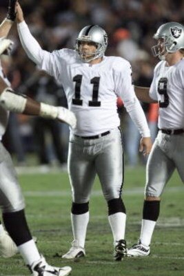 29 Oct 2000:  #11 Sebastian Janikowski of the Oakland Raiders is congratulated by his teammates after kicking a field goal during their game against the San Diego Chargers at Qualcomm Stadium in San Diego, California.  DIGITAL IMAGE. Mandatory Credit: Ste
