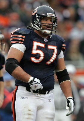 CHICAGO - DECEMBER 17:  Center Olin Kreutz #57 of the Chicago Bears is seen on the field against the Tampa Bay Buccaneers December 17, 2006 at Soldier Field in Chicago, Illinois. The Bears won 34-31 in overtime.  (Photo by Jonathan Daniel/Getty Images)