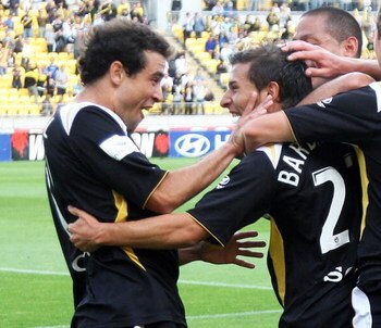 WELLINGTON, NEW ZEALAND - JANUARY 18:  Daniel and Costa Barbarouses of the Phoenix celebrate a goal during the round 20 A-League match between the Wellington Phoenix and Adelaide United held at Westpac Stadium January 18, 2009 in Wellington, New Zealand. 