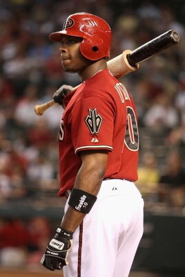 PHOENIX - JULY 26:  Justin Upton #10 of the Arizona Diamondbacks waits to bat during the major league baseball game against the Pittsburgh Pirates at Chase Field on July 26, 2009 in Phoenix, Arizona. The Diamondbacks defeated the Pirates 9-0.  (Photo by C