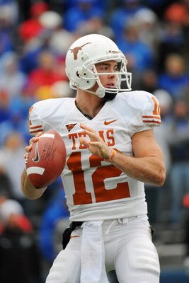 LAWRENCE, KS - NOVEMBER 15:  Colt McCoy #12 of the Texas Longhorns looks to throw against the Kansas Jayhawks on November 15, 2008 at Memorial Stadium in Lawrence, Kansas.  Texas defeated Kansas 35-7. (Photo by G. Newman Lowrance/Getty Images)