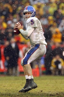 KANSAS CITY, MO - NOVEMBER 29:  Quarterback Todd Reesing #5 of the Kansas Jayhawks looks to pass the ball downfield during the game against the Missouri Tigers on November 29, 2008 at Arrowhead Stadium in Kansas City, Missouri. (Photo by Jamie Squire/Gett