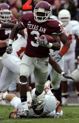 COLLEGE STATION, TX - NOVEMBER 23:  Running back Mike Goodson #3 of the Texas A&M Aggies runs for a touchdown against the Texas Longhorns in the first quarter at Kyle Field on November 23, 2007 in College Station, Texas.  (Photo by Ronald Martinez/Getty I