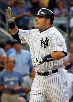 NEW YORK - JULY 20:  Eric Hinske #14 of the New York Yankees celebrates against the Baltimore Orioles on July 20, 2009 at Yankee Stadium in the Bronx borough of New York City.  (Photo by Jim McIsaac/Getty Images)