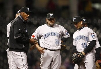 CLEVELAND - APRIL 10:  Cito Gaston #43 of the Toronto Blue Jays talks to his team on the mound against the Cleveland Indians in the eighth inning April 10, 2009 at Progressive Field in Cleveland, Ohio.  (Photo by Matt Sullivan/Getty Images)