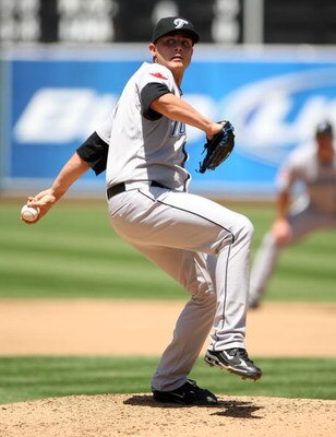 OAKLAND, CA - MAY 10:  Brett Cecil #27 of the Toronto Blue Jays pitches against the Oakland Athletics during a Major League Baseball game on May 10, 2009 at the Oakland Coliseum in Oakland, California.  (Photo by Jed Jacobsohn/Getty Images)