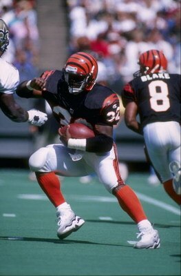 15 Sep 1996:  Running back Ki-Jana Carter of the Cincinnati Bengals carries the football during the Bengals 30-15 victory over the New Orleans Saints at Riverfront Stadium in Cincinnati, Ohio. Mandatory Credit: Andy Lyons  /Allsport