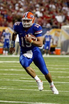 ATLANTA - DECEMBER 06:  Quarterback Tim Tebow #15 of the Florida Gators runs against the Alabama Crimson Tide during the SEC Championship on December 6, 2008 at the Georgia Dome in Atlanta, Georgia. The Gators defeated the Crimson Tide 31-20.  (Photo by C