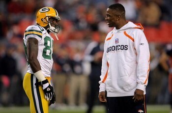 DENVER - OCTOBER 29:  Donald Driver #80 of the Green Bay Packers talks with Javon Walker of the Denver Broncos before a Monday Night Football game at Invesco Field at Mile High on October 29, 2007 in Denver, Colorado.  (Photo by Doug Pensinger/Getty Image