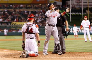 ANAHEIM, CA - JULY 27:  Victor Martinez #41 of the Cleveland Indians celebrates as crosses home plate after hitting a three-run home run in the ninth inning against the Los Angeles Angels of Anaheim at Angel Stadium on July 27, 2009 in Anaheim, California