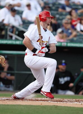 JUPITER, FL - FEBRUARY 25:  Chris Duncan #16 of the St. Louis Cardinals hits into a double play in the first inning against the Florida Marlins during a spring training game at Roger Dean Stadium on February 25, 2009 in Jupiter, Florida. The Marlins and t