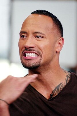 NEW YORK - MARCH 30: (U.S. TABS OUT) Dwayne 'The Rock' Johnson appears on stage during MTV's Total Request Live at the MTV Times Square Studios March 30, 2004 in New York City.  (Photo by Scott Gries/Getty Images)