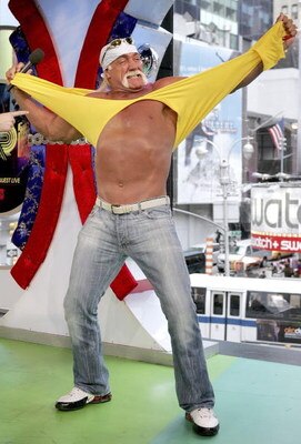 NEW YORK - MARCH 15:  (U.S. TABS OUT) Wrestler Hulk Hogan gives the crowd a taste of 'Hulkamania' as he appears on MTV's Total Request Live at MTV's Time Square Studios March 15, 2006 in New York City.  (Photo by Paul Hawthorne/Getty Images)