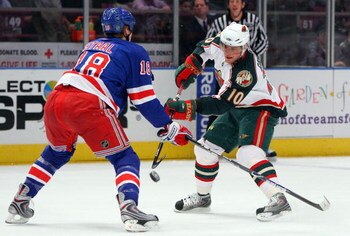 NEW YORK - MARCH 24:  Marian Gaborik #10 of the Minnesota Wild skates against Marc Staal #18 of the New York Rangers on March 24, 2009 at Madison Square Garden in New York City. The Rangers defeated the Wild 3-2.  (Photo by Jim McIsaac/Getty Images)