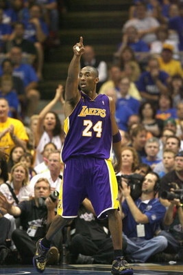 ORLANDO, FL - JUNE 14:  Kobe Bryant #24 of the Los Angeles Lakers points down the court during Game Five of the 2009 NBA Finals against the Orlando Magic on June 14, 2009 at Amway Arena in Orlando, Florida. The Lakers won 99-86. NOTE TO USER:  User expres