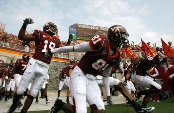 BLACKSBURG, VA - SEPTEMBER 01:  The Virginia Tech football team takes the field after a ceremony honoring the 32 victims of the shooting at the school, before the start of the season opener September 1, 2007 at Lane Stadium in Blacksburg, Virginia. In add