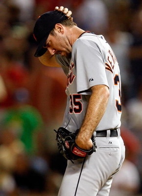 ARLINGTON, TX - JULY 29:  Pitcher Justin Verlander #35 of the Detroit Tigers reacts after giving up two runs on a double by Michael Young #10 of the Texas Rangers on July 29, 2009 at Rangers Ballpark in Arlington, Texas.  (Photo by Ronald Martinez/Getty I