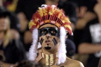 TALLAHASSEE, FL - OCTOBER 27: A fan of the Florida State Seminoles cheers during play against the Duke Blue Devils at Doak Campbell Stadium on October 27, 2007 in Tallahassee, Florida.  FSU won 25-6. (Photo by Al Messerschmidt/Getty Images) *** Local Capt